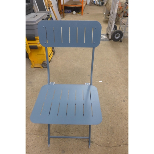 5182 - A blue metal folding bistro table and two chairs