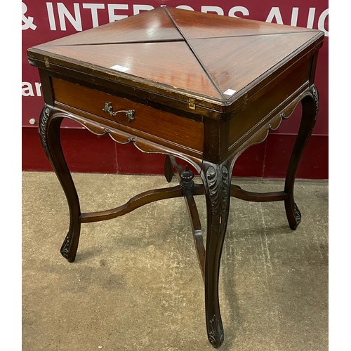 77 - An Edward VII mahogany envelope card table