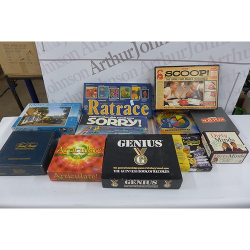 5276 - A large quantity of board games including Trivial pursuit, rat race, articulate, scoop genius, mid l... 