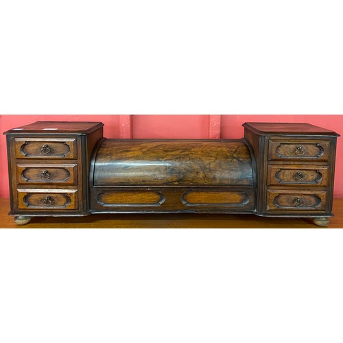 80 - A Victorian figured walnut desk top stationery cabinet