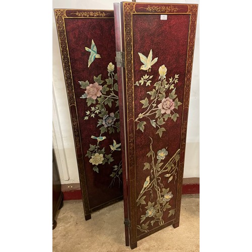 82 - A Chinoiserie scarlet lacquered folding dressing screen