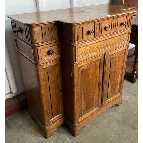 87 - A 19th Century French oak and walnut breakfront sideboard