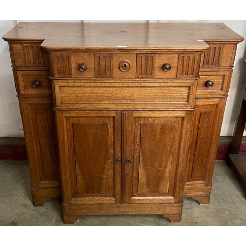 87 - A 19th Century French oak and walnut breakfront sideboard