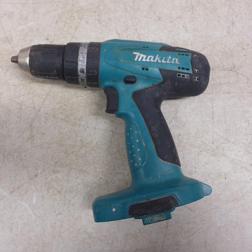 5006 - 2 Makita drills - an 8280D and an 8391D with a 14.4V battery charger and 7 assorted batteries