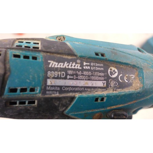 5006 - 2 Makita drills - an 8280D and an 8391D with a 14.4V battery charger and 7 assorted batteries