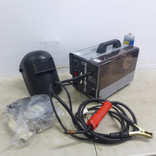 5005 - A HandyMig 230v, 80A welder with a welding mask and a quantity of consumables including a roll of we... 