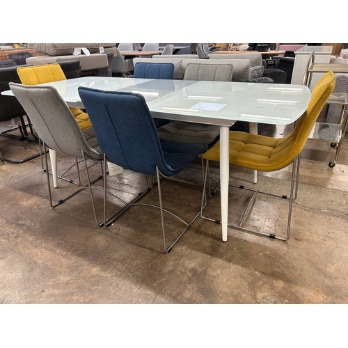 3108 - A white glass top extending dining table with six contrasting chairs