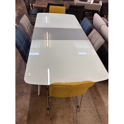 3108 - A white glass top extending dining table with six contrasting chairs