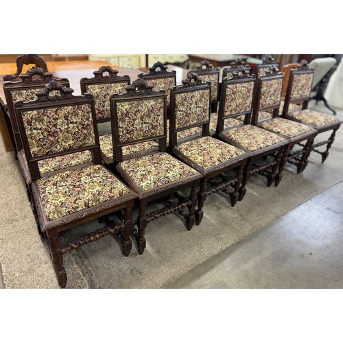 173 - A set of twelve 19th Century French carved oak dining chairs