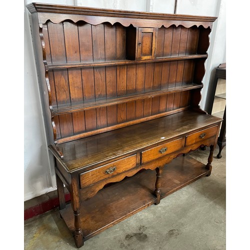 117 - A George III style oak dresser