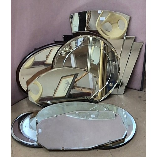 303 - Seven assorted bevelled edge mirrors