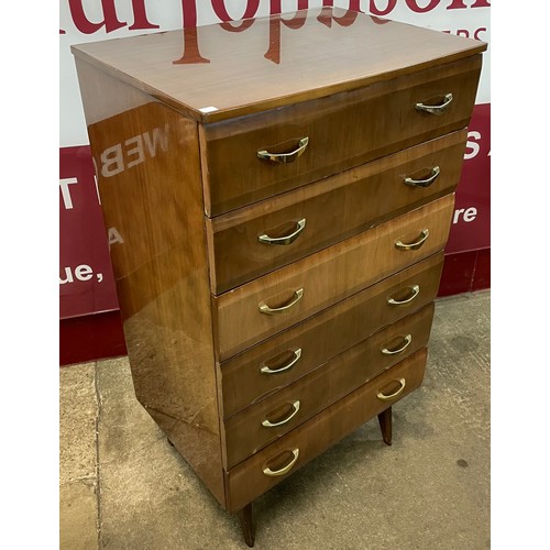 65F - A walnut chest of drawers