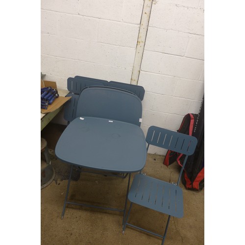 5181 - A blue metal folding bistro table and two chairs