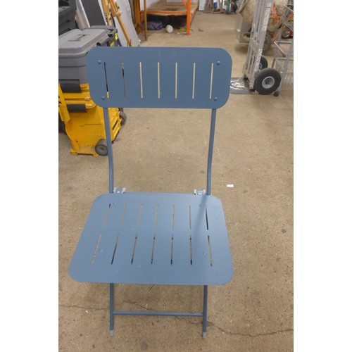 5181 - A blue metal folding bistro table and two chairs