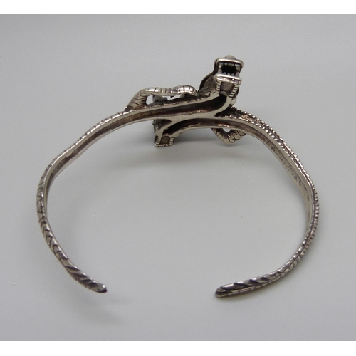 1002 - A 925 silver twin dragon detail bangle, 32.8g