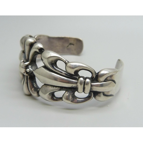 1006 - A heavy silver bangle, 52.6g