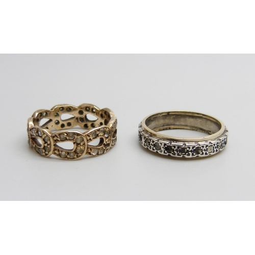 1011 - A 9ct gold ring and a 9ct and silver ring lacking some marcasite, total weight 5g, both size K