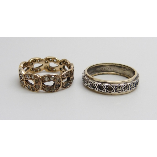 1011 - A 9ct gold ring and a 9ct and silver ring lacking some marcasite, total weight 5g, both size K