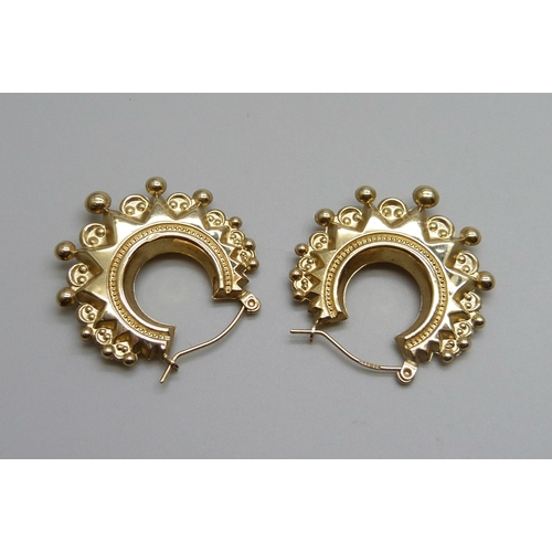 1012 - A pair of 9ct gold fancy hoop earrings, 2.4g