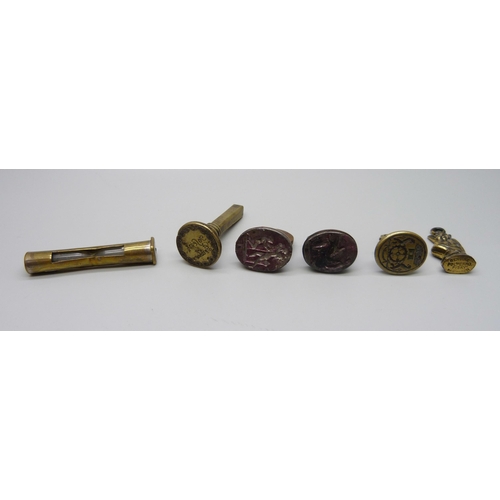 1027 - Four seals, a brass timer and a Polperro Pisky charm