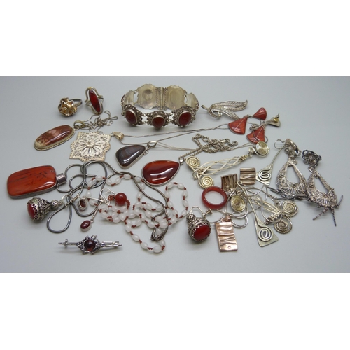 1034 - A collection of jewellery including red stone set and filigree