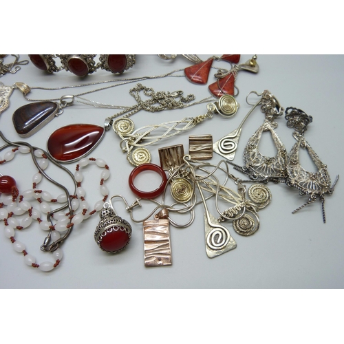 1034 - A collection of jewellery including red stone set and filigree