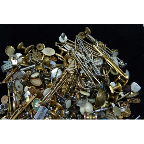 1046 - A collection of cufflinks and tie-pins, (mainly singles)