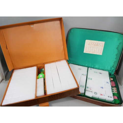 1060 - Two Mah-Jong sets with cards and counters and dominoes, etc. **PLEASE NOTE THIS LOT IS NOT ELIGIBLE ... 