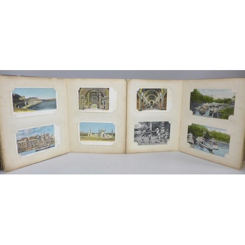 682 - An early 20th Century album of 52 Japanese postcards, lacquered boards