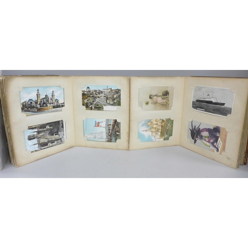 682 - An early 20th Century album of 52 Japanese postcards, lacquered boards