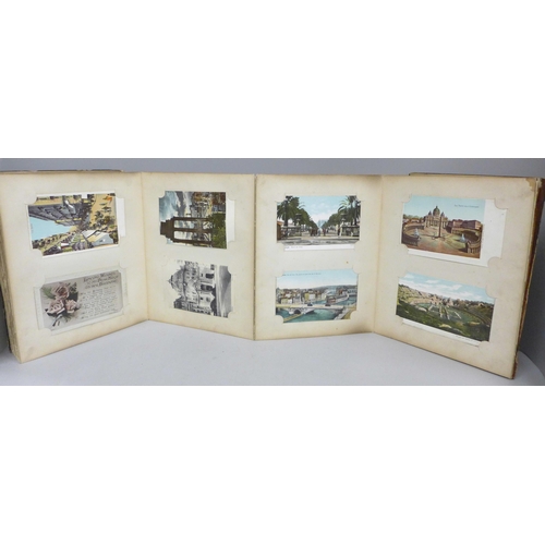 682 - An early 20th Century album of 52 Japanese postcards, lacquered boards