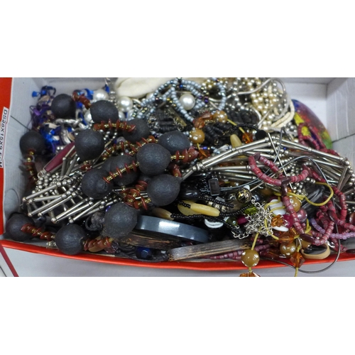 696 - A box of costume jewellery