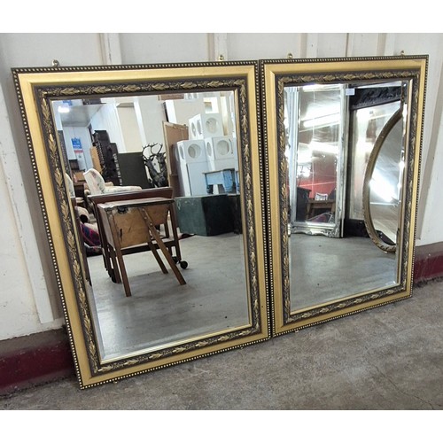 309 - A pair of French style gilt framed mirrors