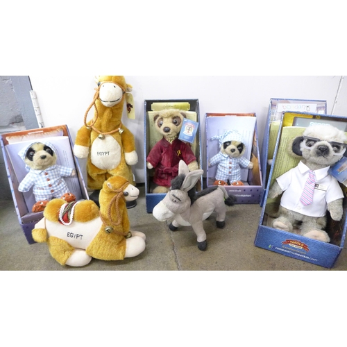 1103 - A collection of boxed Meerkat toys with certificates, together with other toys including a talking d... 