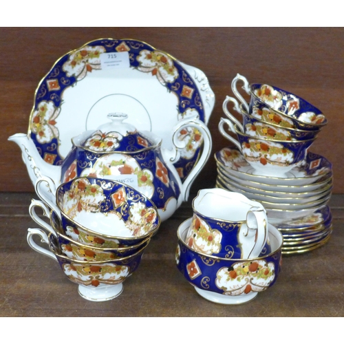 715 - A Royal Albert Heirloom six setting tea service with teapot, cream and sugar, second quality **PLEAS... 