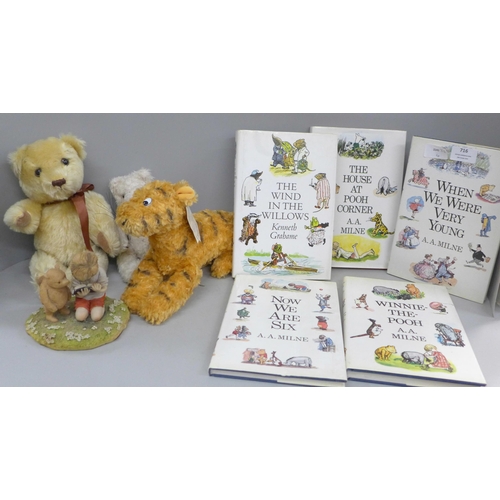 716 - Winnie the Pooh collection, five books, an Arden Sculpture figure, a Gund soft toy Tigger and two ot... 