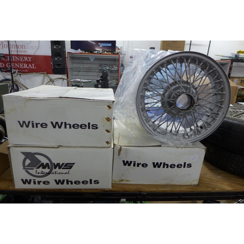 5296 - A set of four boxed MWS XW515/CR wire wheels