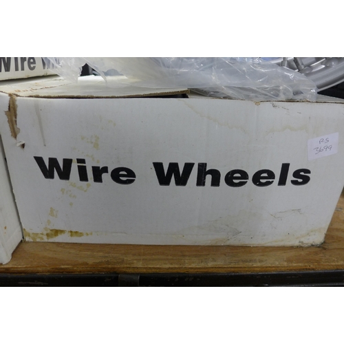 5296 - A set of four boxed MWS XW515/CR wire wheels