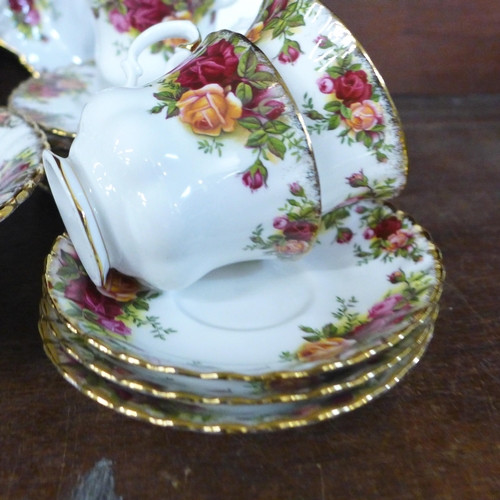 724 - A six setting Royal Albert Old Country Roses china tea service with bread and butter plate, two pots... 