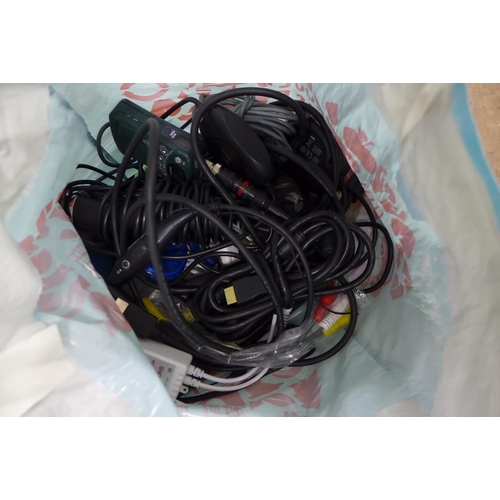 5314 - A bag of assorted cables including scart leads, microphone, walkie talkies and many more