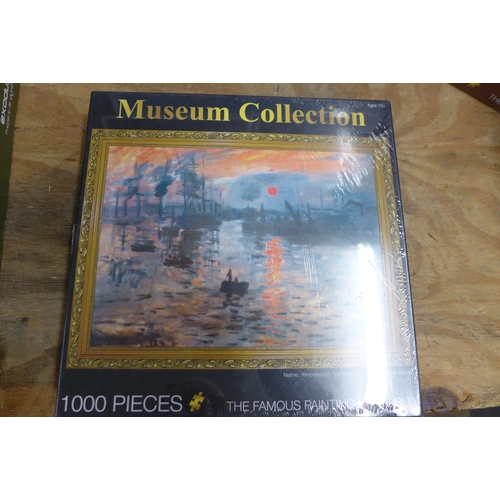 5319 - 5 assorted 1000 piece jigsaw puzzles, Taj Mahal, Van Gogh Café, Alsace scene, Monet Soleil Levante, ... 