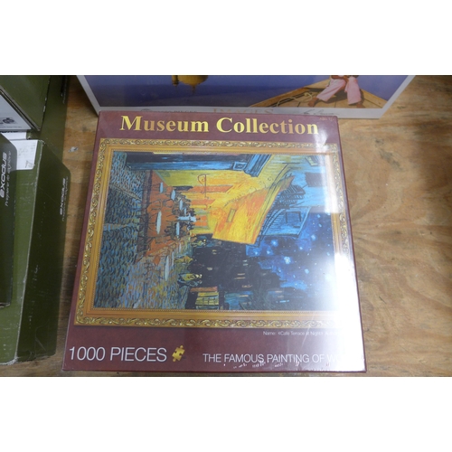 5319 - 5 assorted 1000 piece jigsaw puzzles, Taj Mahal, Van Gogh Café, Alsace scene, Monet Soleil Levante, ... 