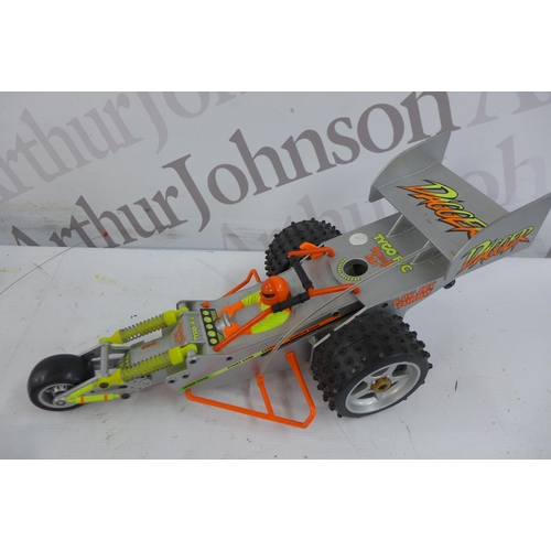 5327 - A box of RC cars and component parts and other related items including a petrol powered Kyosho RC ca... 