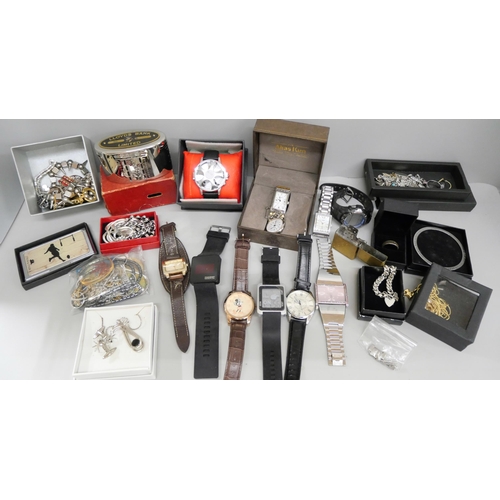 745 - A collection of costume jewellery including watches, necklaces, Zippo lighter, etc., and a small amo... 