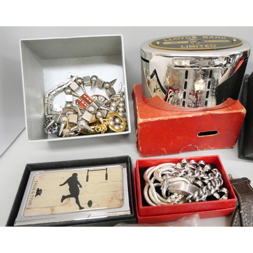 745 - A collection of costume jewellery including watches, necklaces, Zippo lighter, etc., and a small amo... 