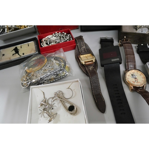 745 - A collection of costume jewellery including watches, necklaces, Zippo lighter, etc., and a small amo... 