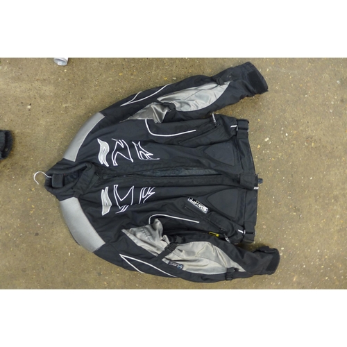 5330 - A quantity of motorcycle clothing including two crash helmets, a pair of boots, tank bag, Nitro leat... 