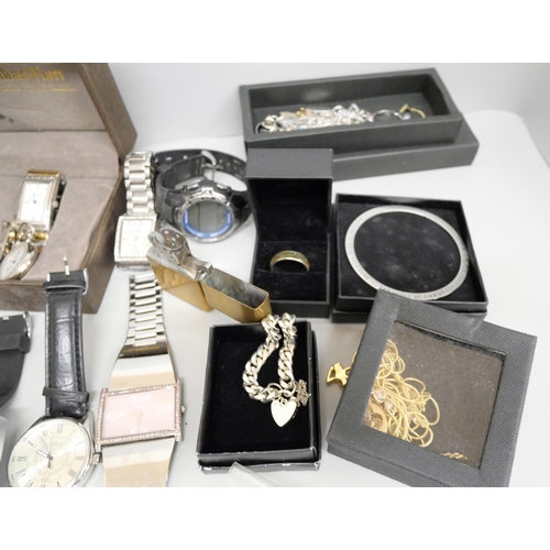 745 - A collection of costume jewellery including watches, necklaces, Zippo lighter, etc., and a small amo... 