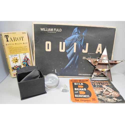 757 - A Ouija board, a set of Tarot Fortune Telling cards (game), a Fortune Telling publication by Madame ... 