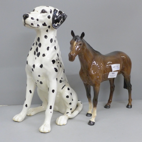 606 - Two Beswick figures, dalmatian, damage to nose and a large racehorse, one ear restored